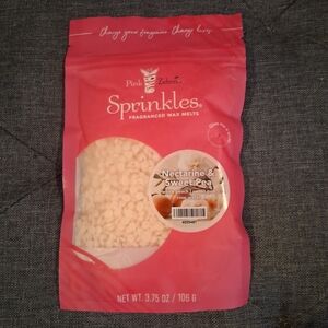 Pink Zebra Nectarine & Sweet Pea Wax Melts in Pink Package